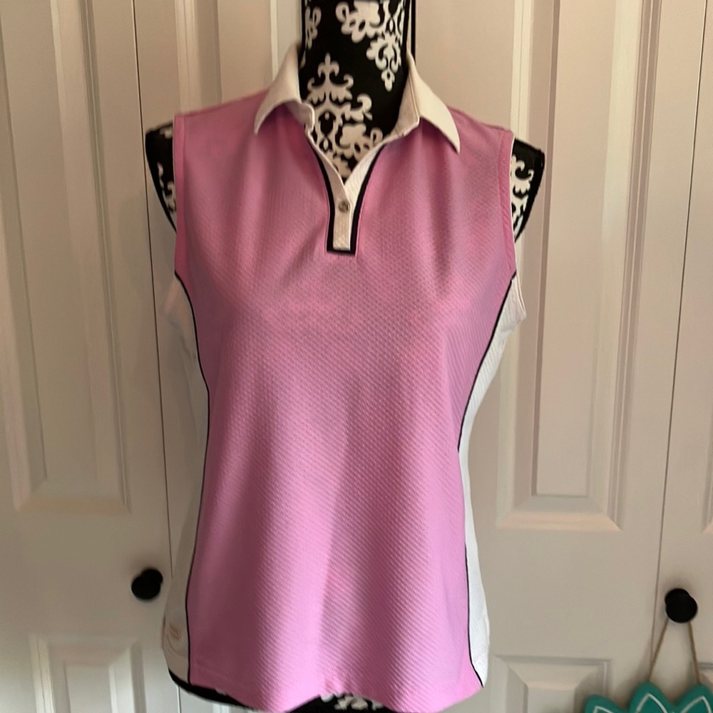 Cute pink white and black sleeveless golf shirt in fun waffle pattern.